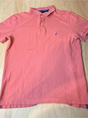 Nautica Coral Polo with Blue Sailboat Emblem